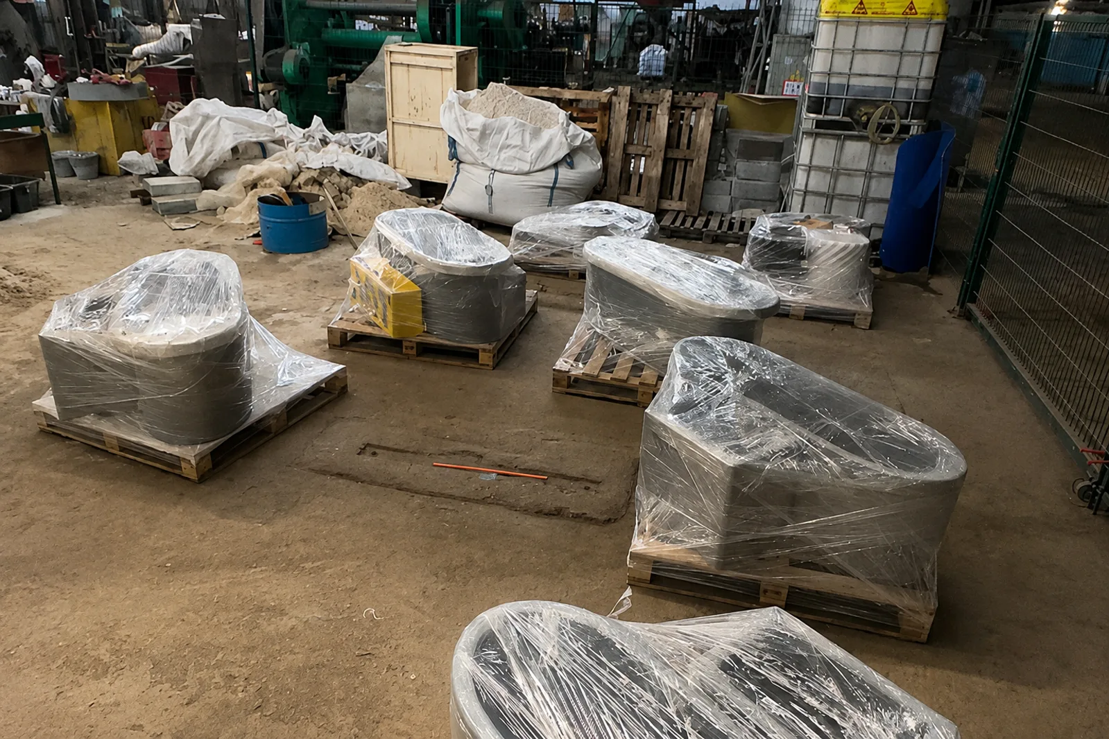Finished printed components wrapped and secured on pallets
